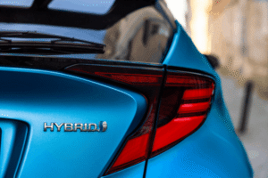Hybrid transmission repair, auto repair in Locust, NC by Whitley Automotive. Image of a hybrid badge on a modern vehicle, highlighting specialized care, advanced diagnostics, and reliable maintenance for hybrid systems.