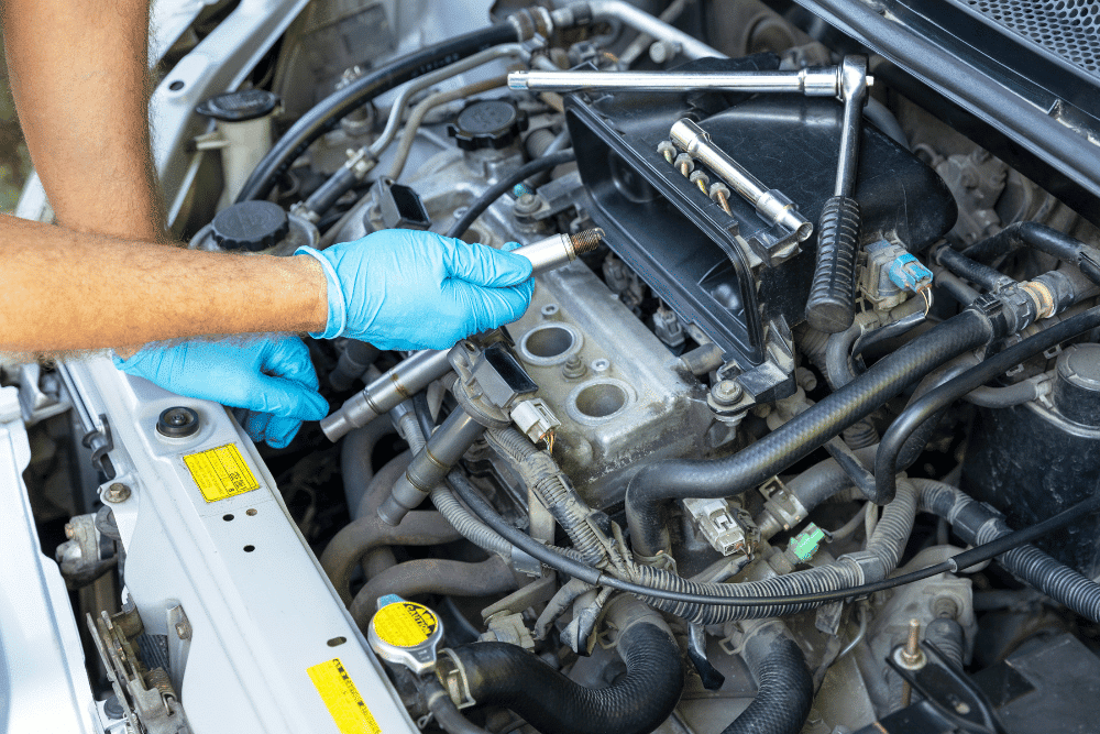 Engine Misfire Diagnosis in Locust, NC by Whitley Automotive, image of a vehicle's engine being inspected
